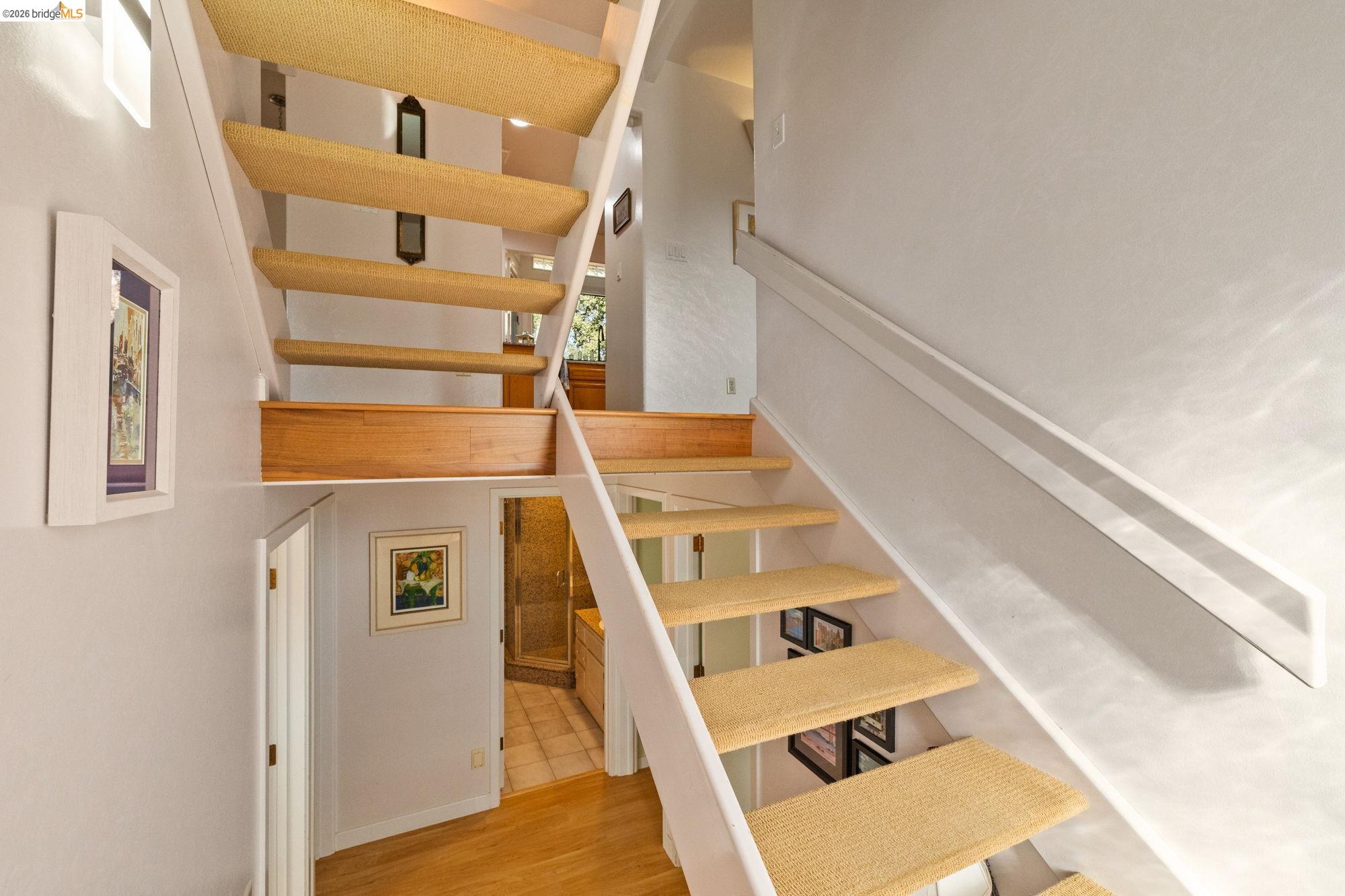 10566 Thistle Down Road Jamestown, CA 95327 - Photo 28 of 53 Staircase featuring wood finished floors and baseboards
