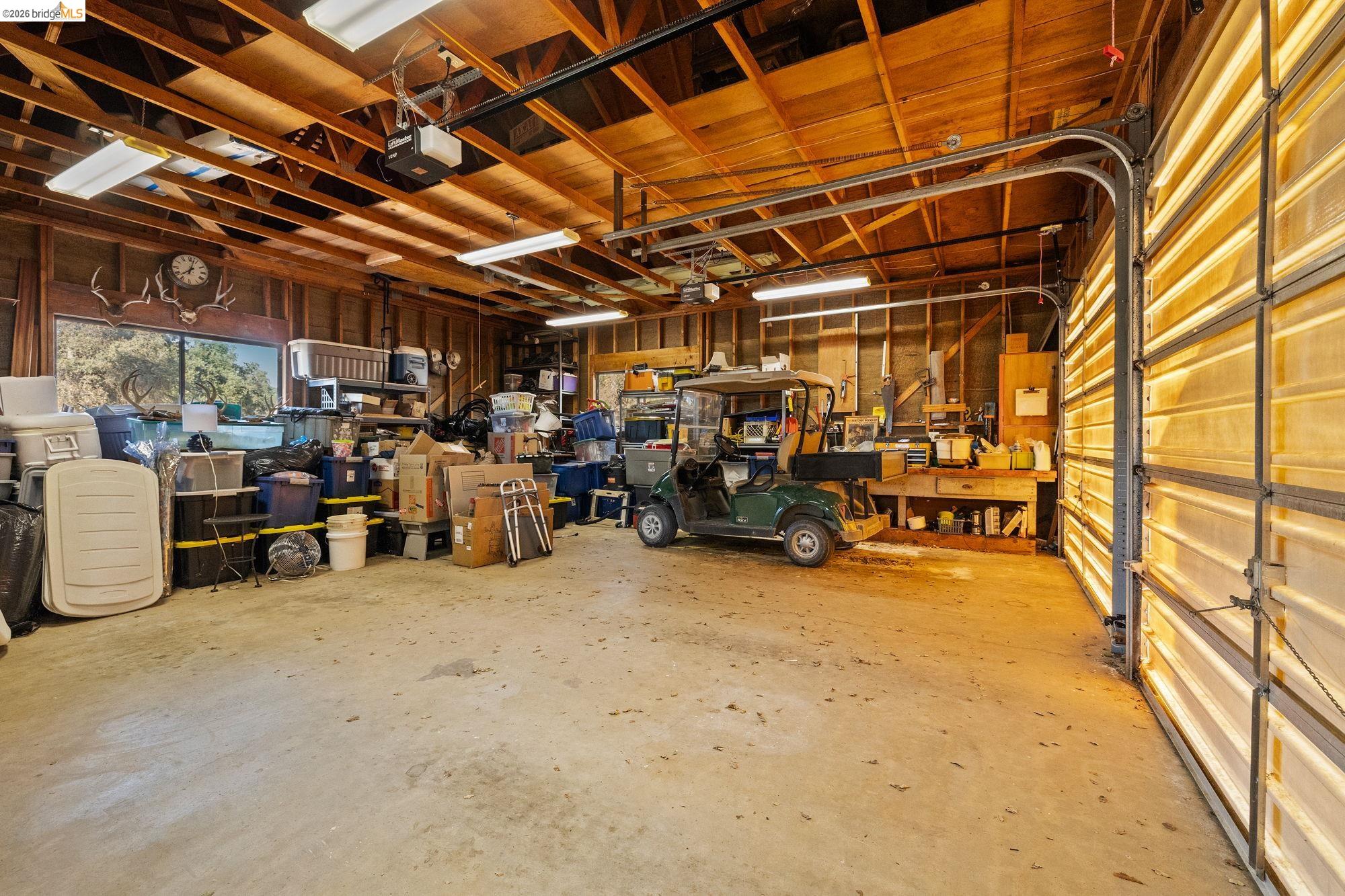 10566 Thistle Down Road Jamestown, CA 95327 - Photo 36 of 53 Garage with a garage door opener