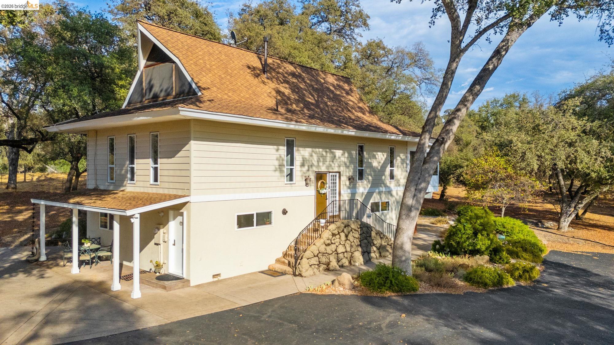 10566 Thistle Down Road Jamestown, CA 95327 - Photo 41 of 53 View of front of house featuring roof with shingles