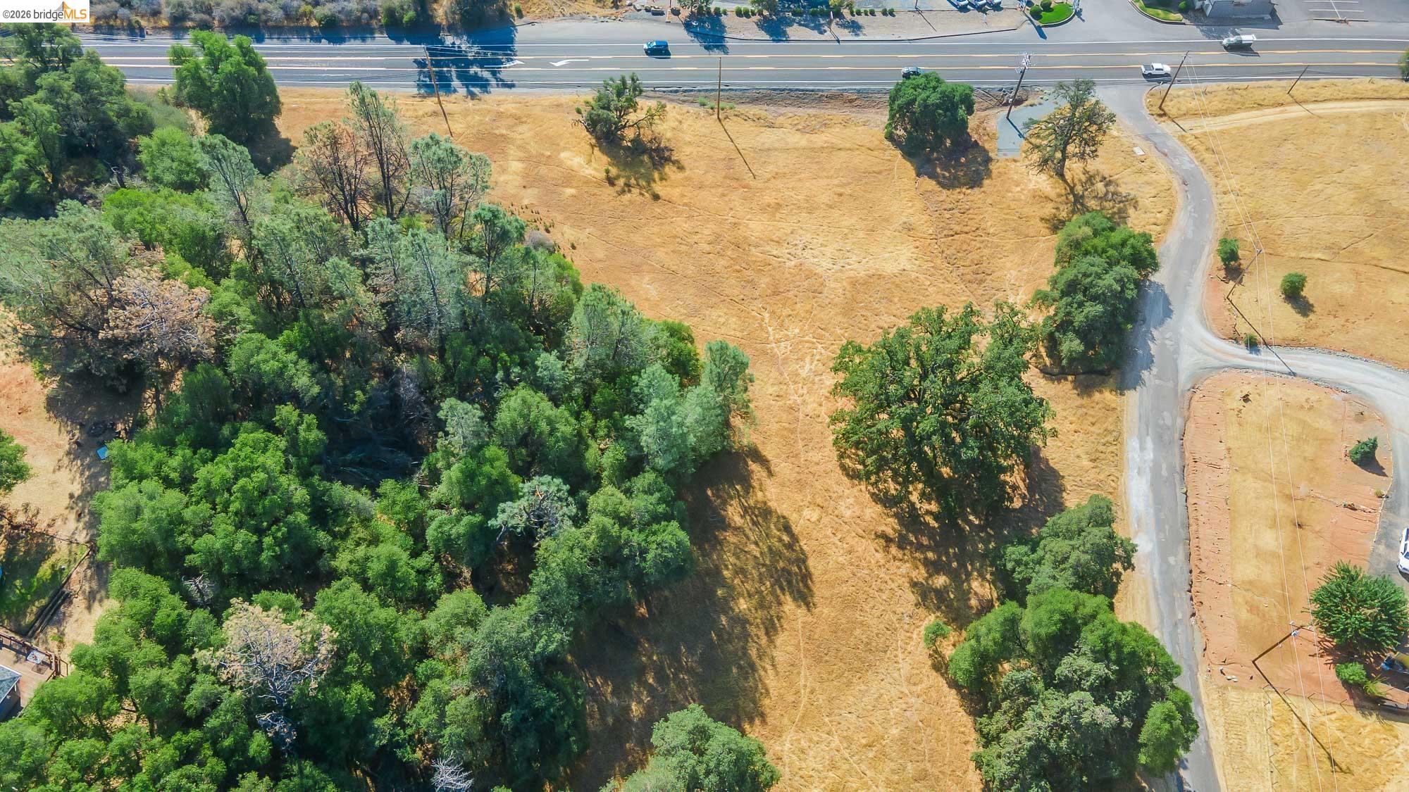 0 Sturgis Road Sonora, CA 95370 - Photo 4 of 18 an aerial view of a house with a lake view