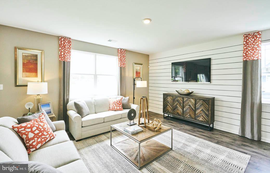 62 Buttercup Circle Elkton, MD 21921 - Photo 15 of 36 a living room with furniture and a flat screen tv
