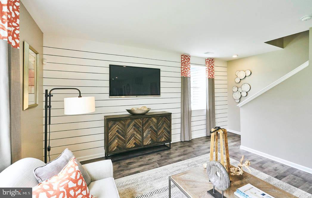 62 Buttercup Circle Elkton, MD 21921 - Photo 19 of 36 a living room with furniture and a flat screen tv
