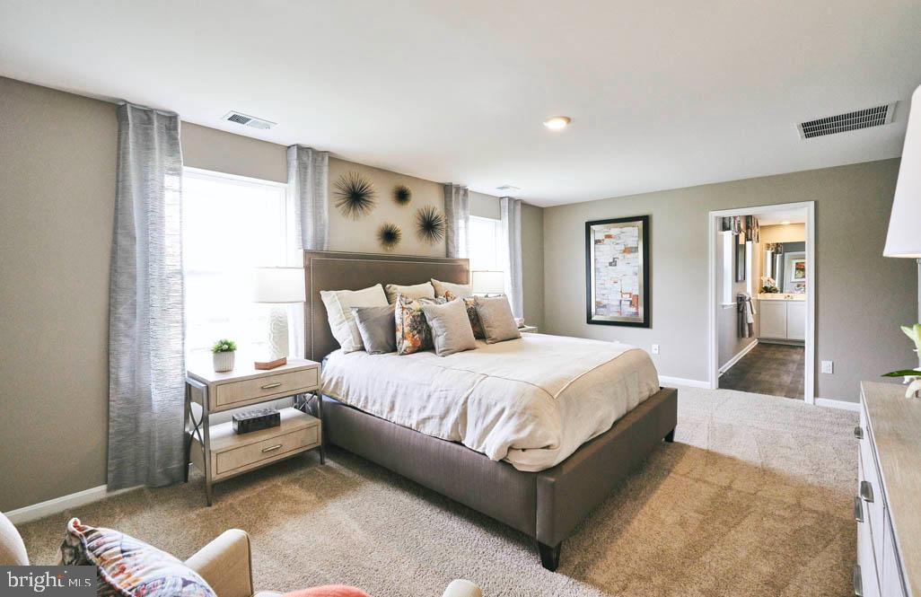 62 Buttercup Circle Elkton, MD 21921 - Photo 23 of 36 a spacious bedroom with a bed and window