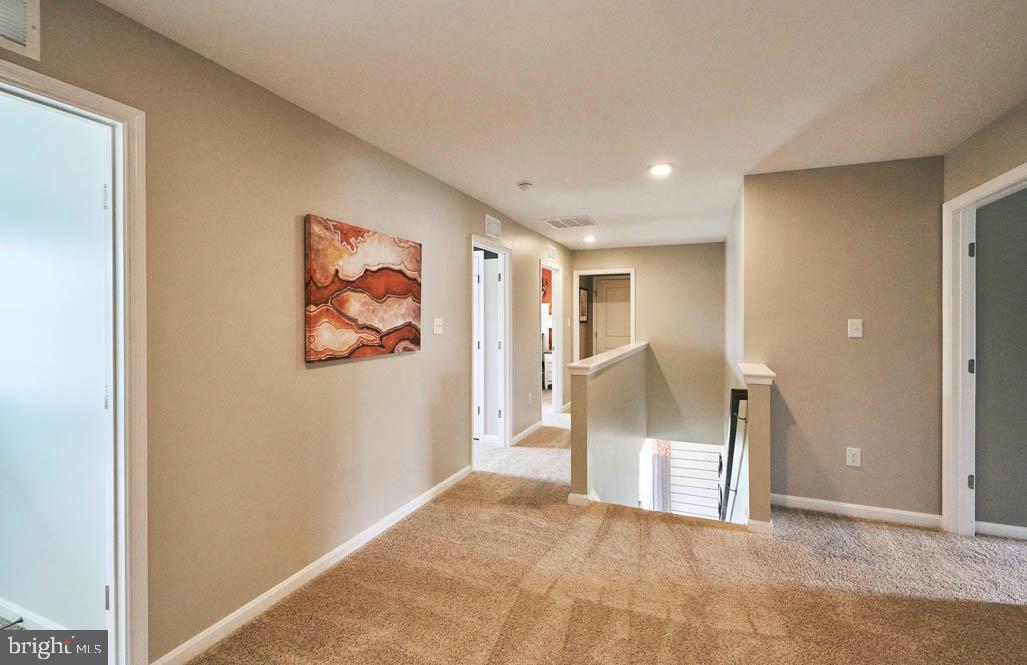 62 Buttercup Circle Elkton, MD 21921 - Photo 29 of 36 a view of a livingroom with wooden floor and a cabinet