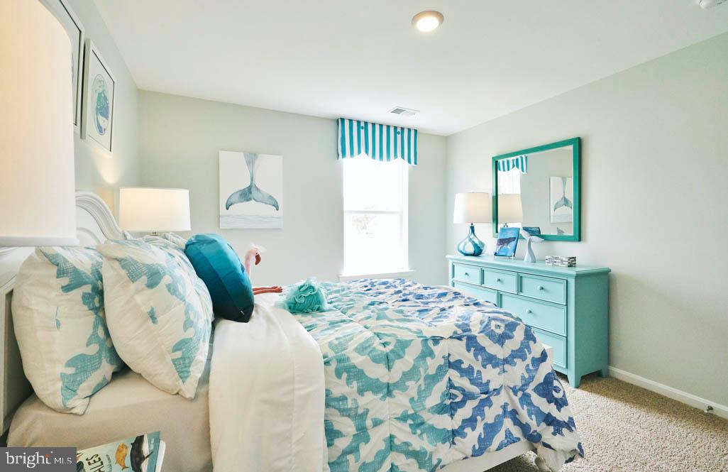 62 Buttercup Circle Elkton, MD 21921 - Photo 31 of 36 a bedroom with a bed and window