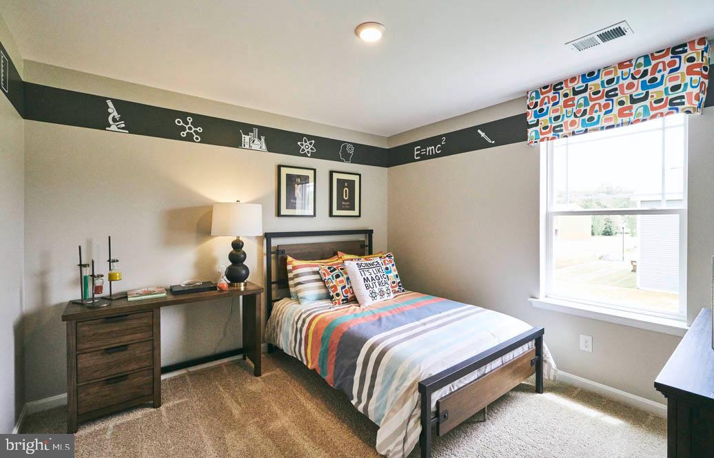 62 Buttercup Circle Elkton, MD 21921 - Photo 33 of 36 a bedroom with a bed and a window