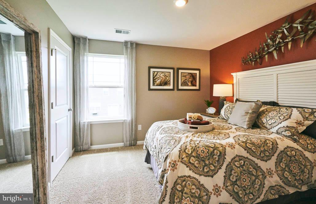 62 Buttercup Circle Elkton, MD 21921 - Photo 35 of 36 a bedroom with two beds and a window