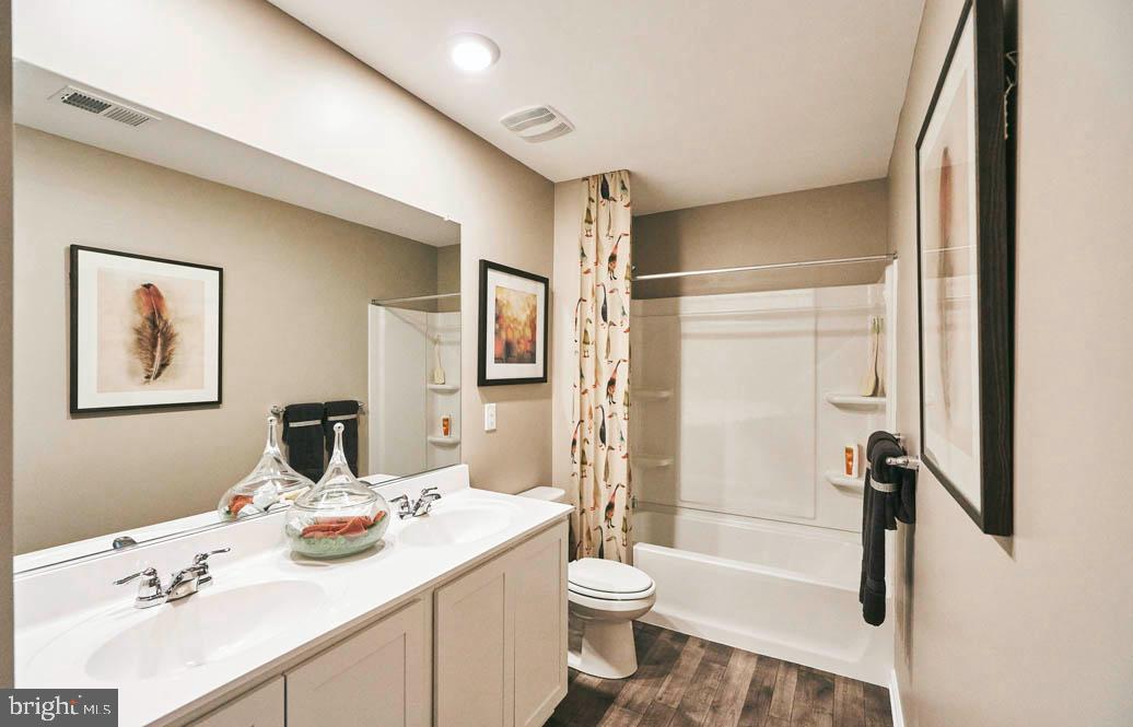 62 Buttercup Circle Elkton, MD 21921 - Photo 36 of 36 a bathroom with a sink toilet and shower