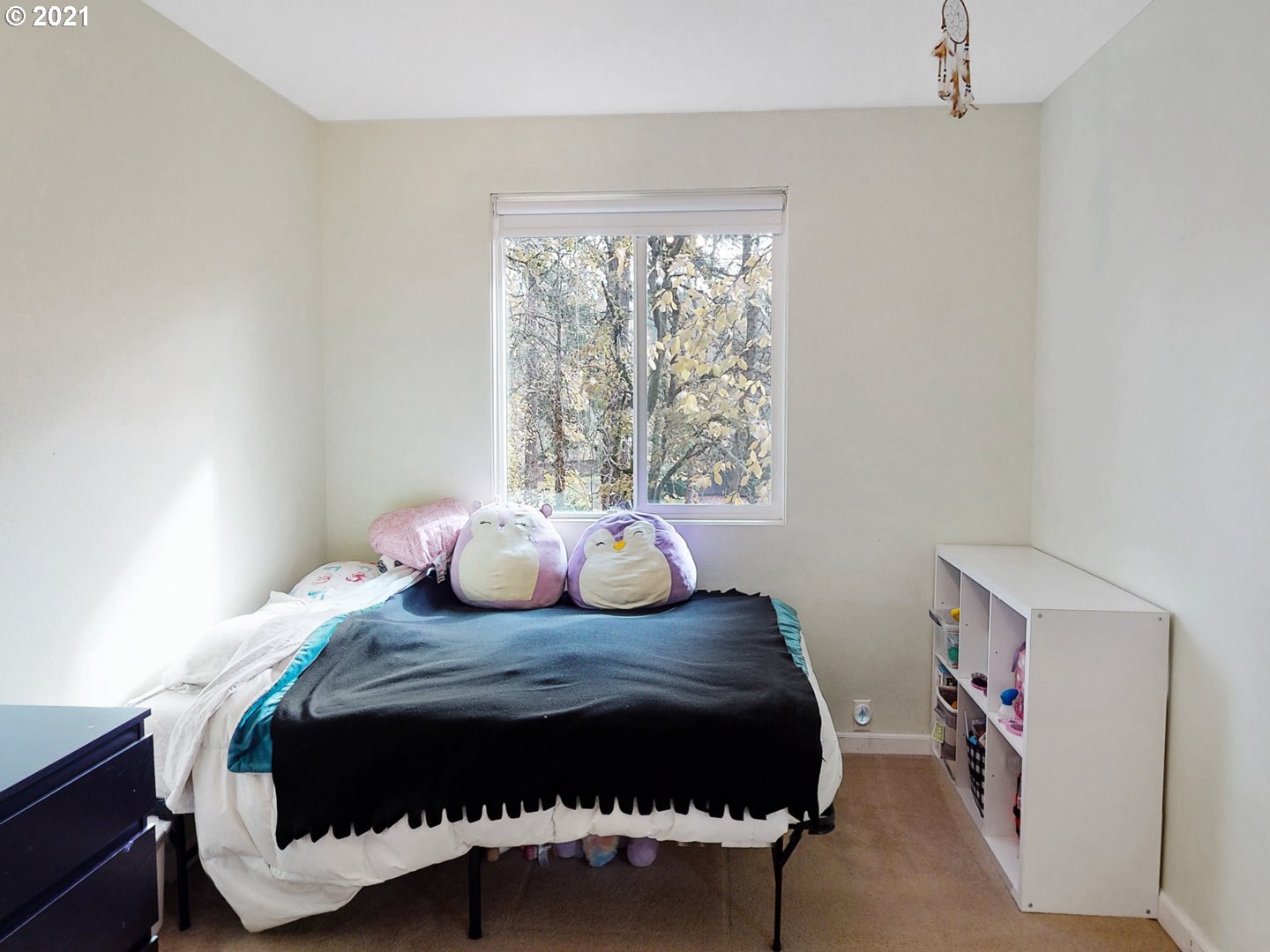 40 Brae Burn Drive Eugene, OR 97405 - Photo 23 of 32 a bedroom with a bed and window