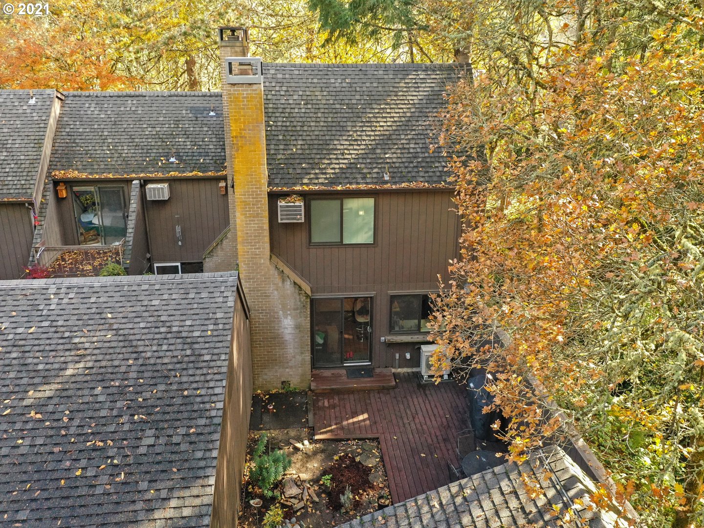 40 Brae Burn Drive Eugene, OR 97405 - Photo 28 of 32 a view of a brick house that has large tree and a yard