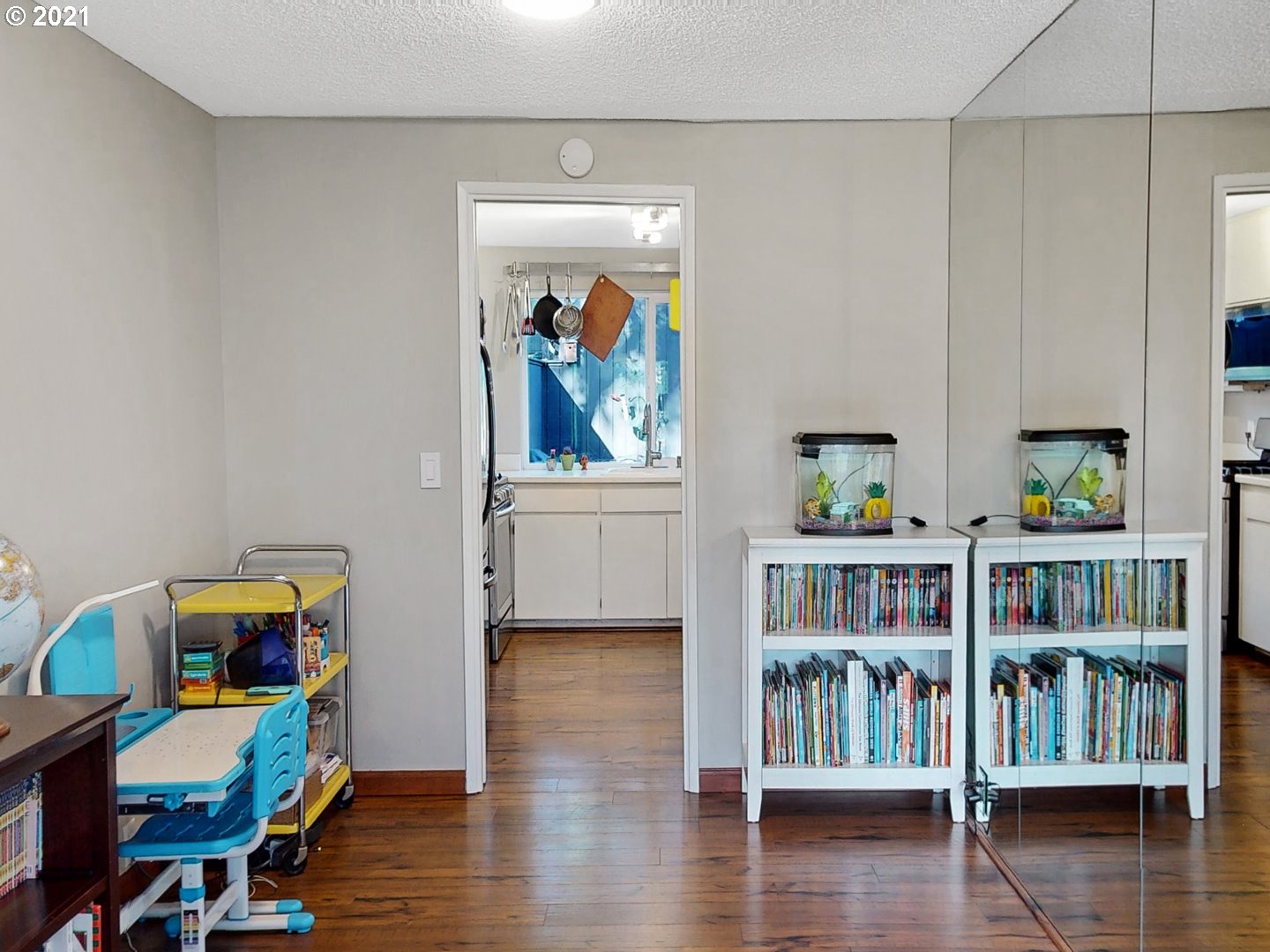 40 Brae Burn Drive Eugene, OR 97405 - Photo 9 of 32 a view of a workspace with furniture and wooden floor