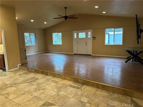 a kitchen with a stove top oven sink and cabinets