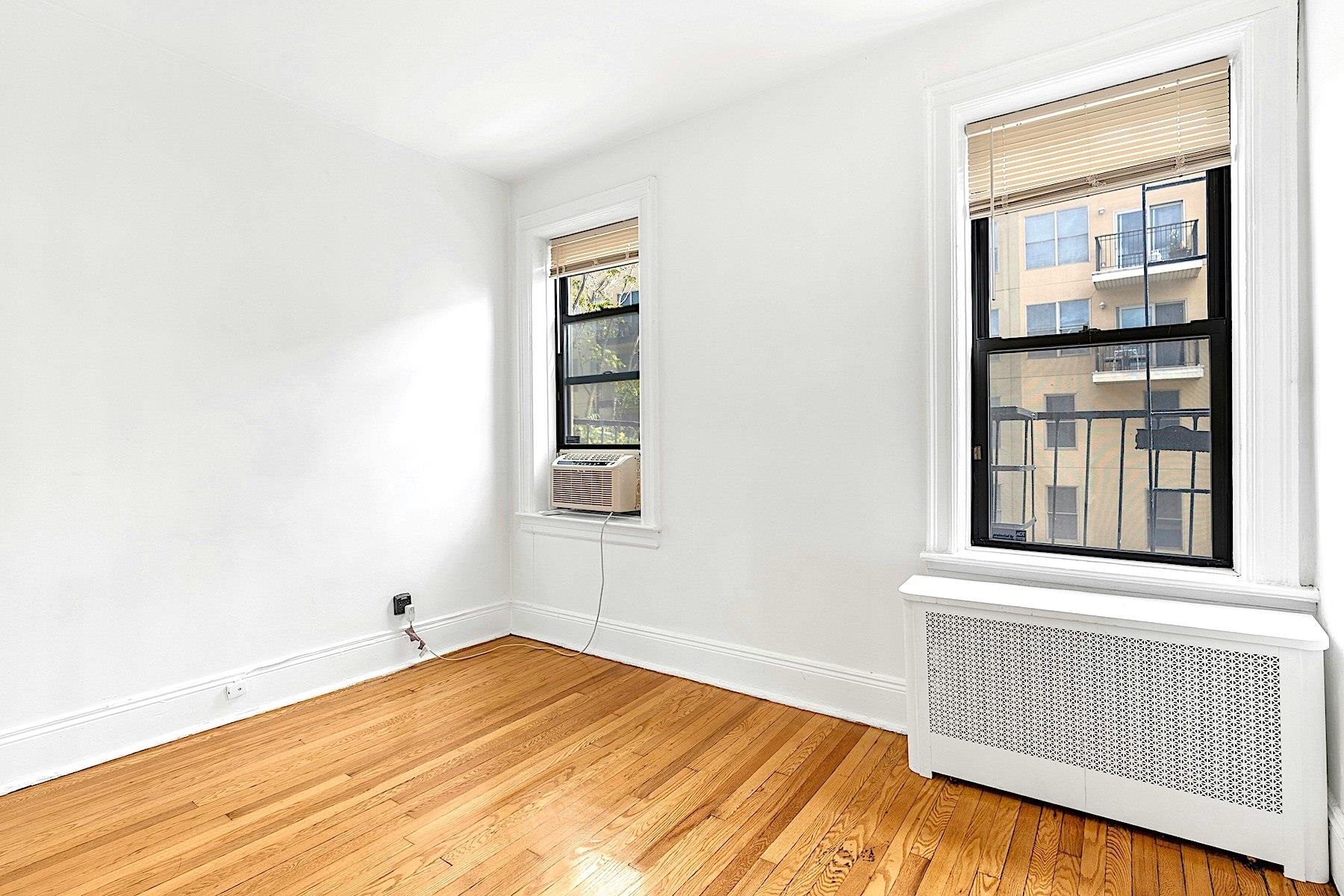 79 Madison Street, Unit 4A Hoboken, NJ 07030 - Photo 10 of 17 a view of an empty room with a window