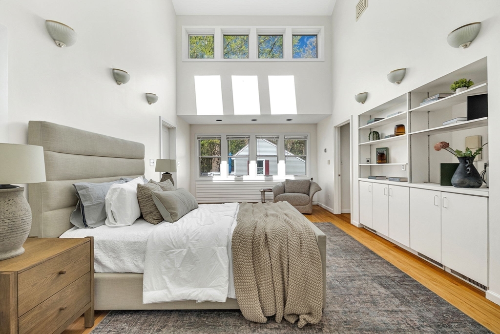 10 Bennett Road Wayland, MA 01778 - Photo 17 of 32 a bed room with a bed and a large window