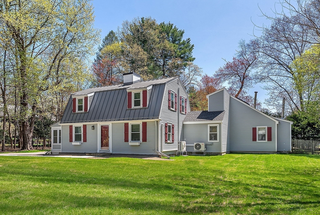 10 Bennett Road Wayland, MA 01778 - Photo 2 of 32 a view of a yard in front of a house