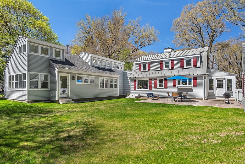 10 Bennett Road Wayland, MA 01778 - Photo 4 of 32 a view of a house with a yard