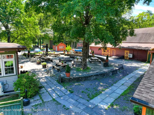 a view of a house that has a small garden