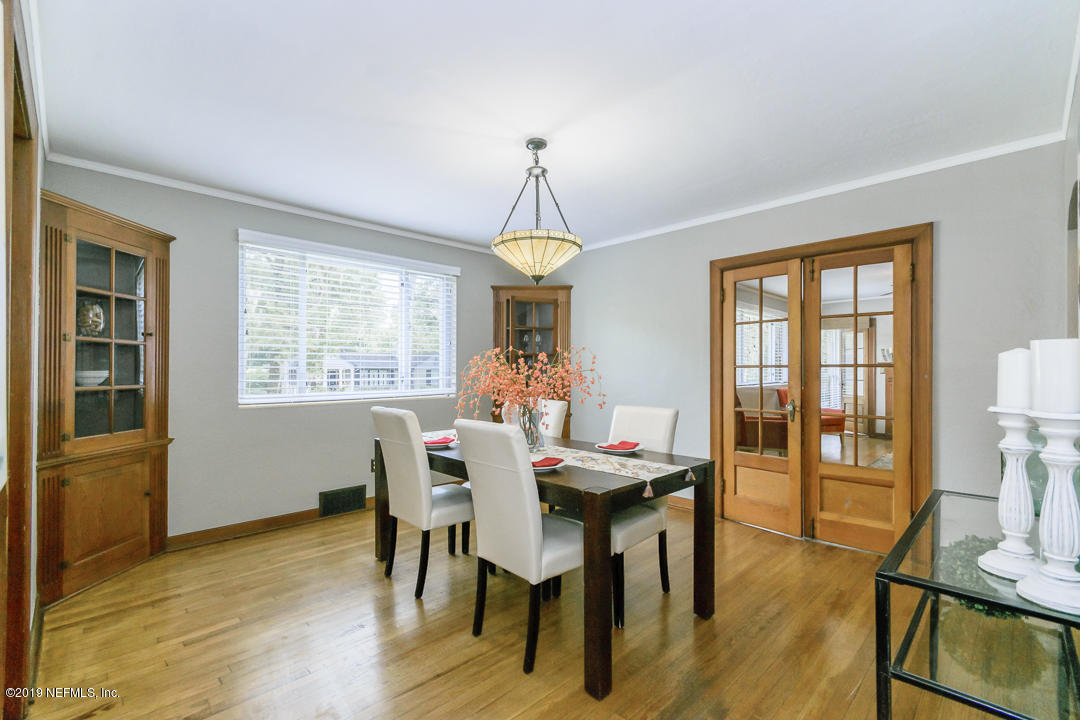 1816 Lorimier Road Jacksonville, FL 32207 - Photo 8 of 25 a dining room with furniture window wooden floor