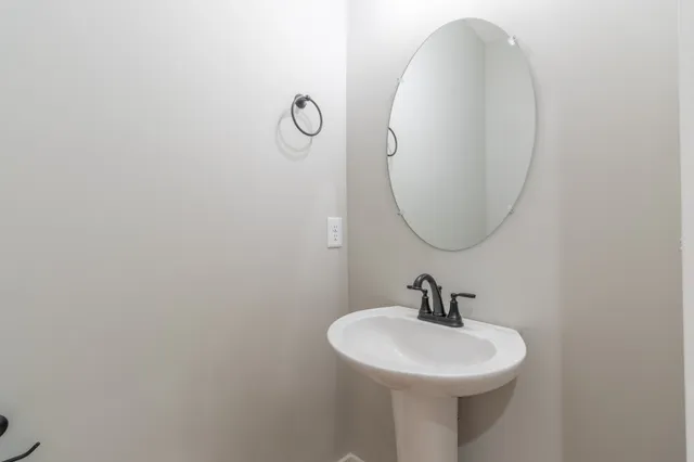 a view of balcony with wooden floor and fence