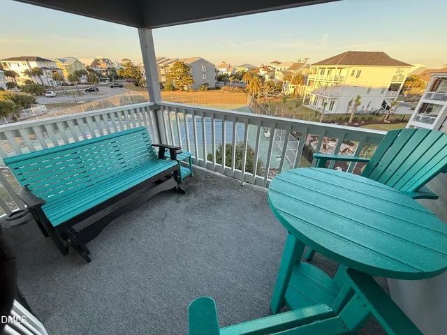 a view of a two chairs in the roof deck