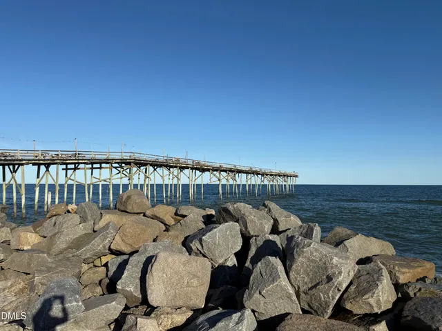 a view of a balcony with chairs