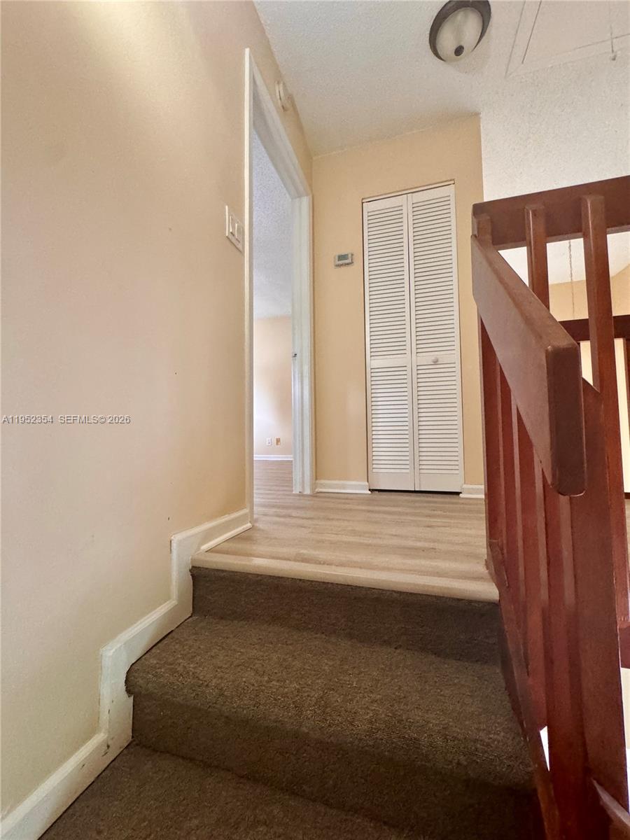 4879 North Hemingway Circle Margate, FL 33063 - Photo 20 of 44 a bedroom with a bed and a window