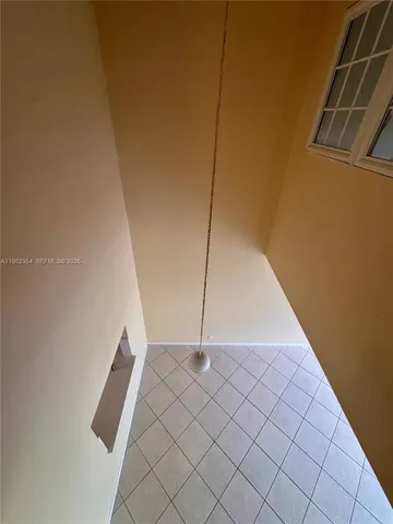 a view of a room with white door