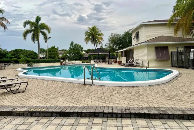 a view of outdoor space yard and swimming pool