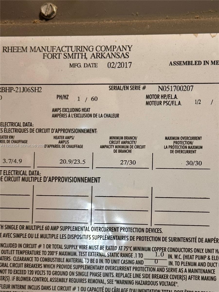 4879 North Hemingway Circle Margate, FL 33063 - Photo 41 of 44 a picture of a book and a bed