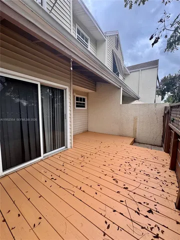 a view of a backyard of the house