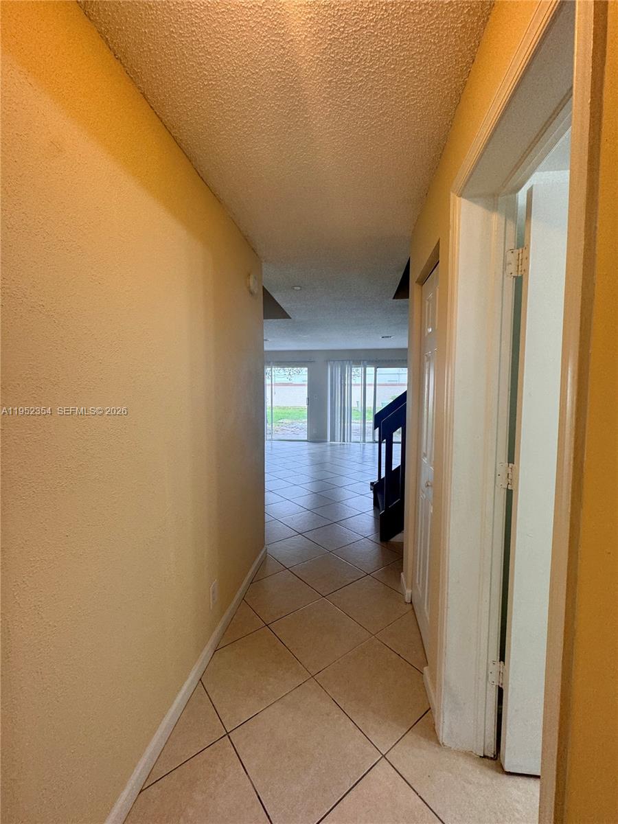 4879 North Hemingway Circle Margate, FL 33063 - Photo 6 of 44 a view of a hallway