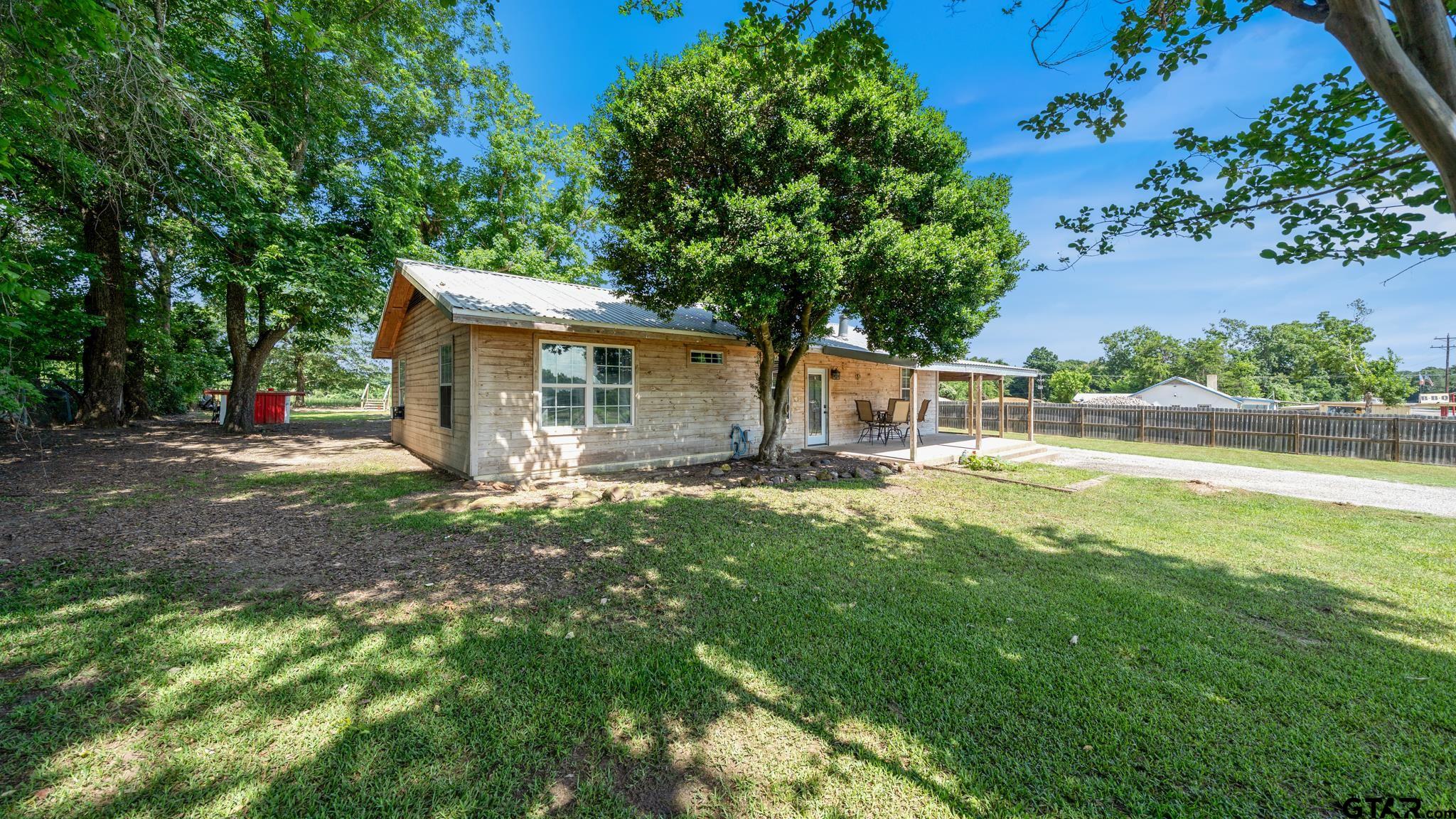 29080 Highway 19 Athens, TX 75752 - Photo 3 of 30 a view of a house with backyard and a tree