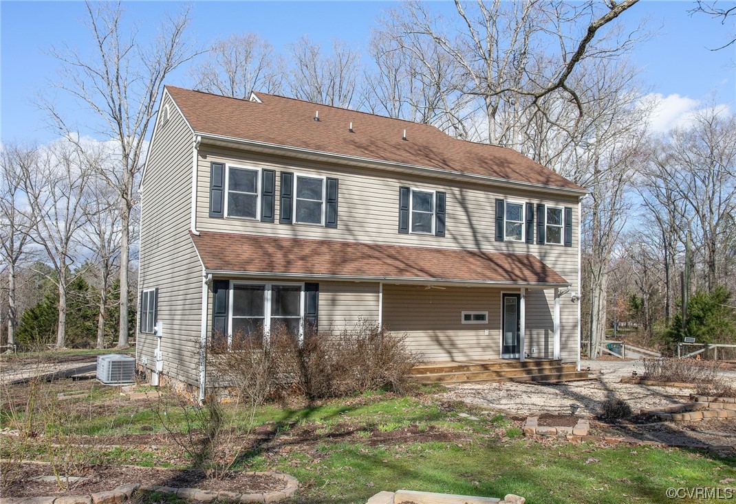 901 Hockett Road Manakin-Sabot, VA 23103 - Photo 1 of 39 a front view of a house with a yard