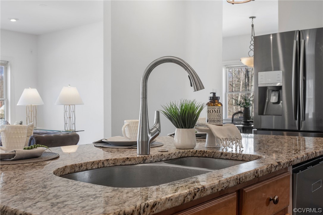901 Hockett Road Manakin-Sabot, VA 23103 - Photo 15 of 39 a kitchen with granite countertop a sink and a refrigerator