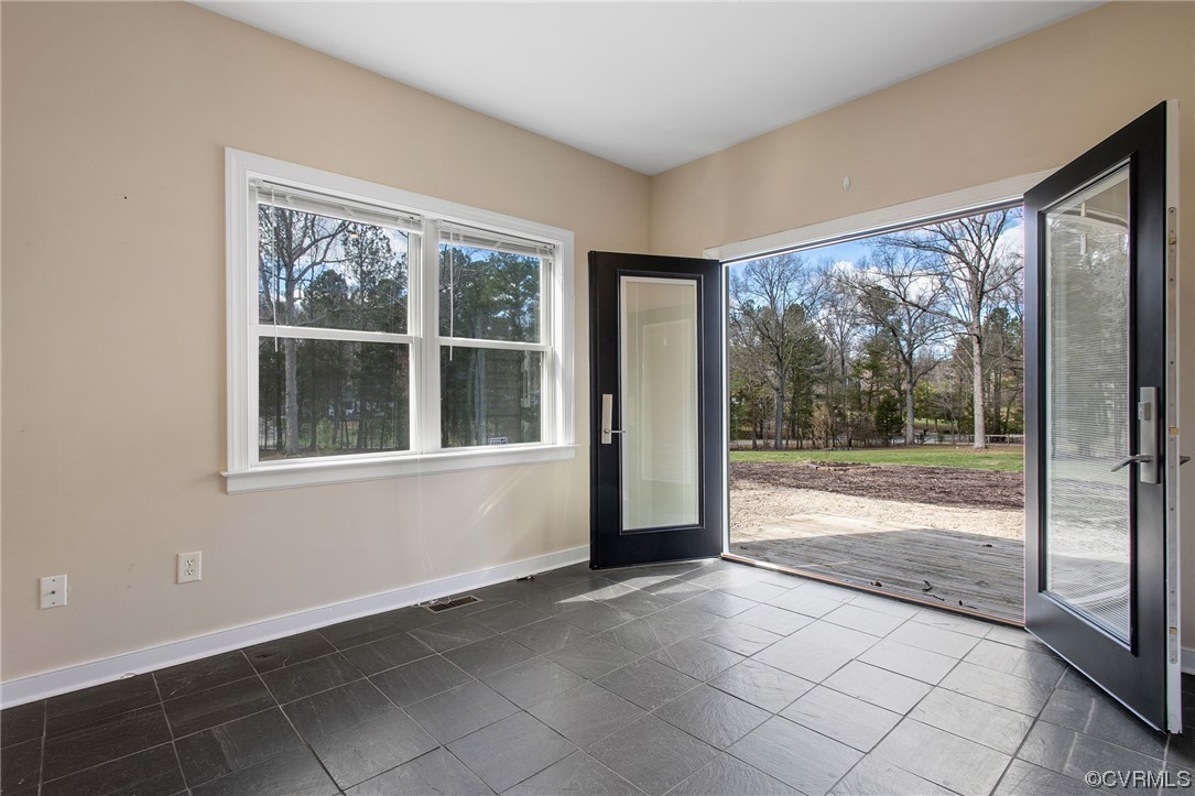 901 Hockett Road Manakin-Sabot, VA 23103 - Photo 18 of 39 a view of a room with entryway and a floor to ceiling window