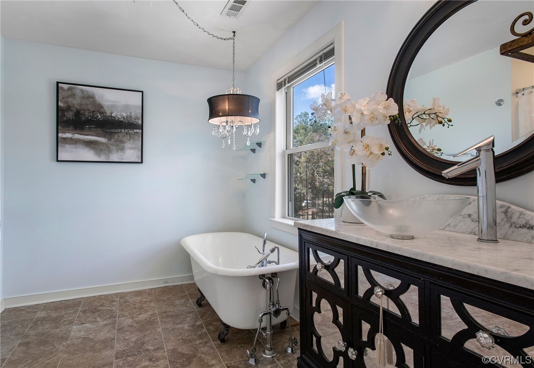 901 Hockett Road Manakin-Sabot, VA 23103 - Photo 25 of 39 a bathroom with a granite countertop sink and a mirror