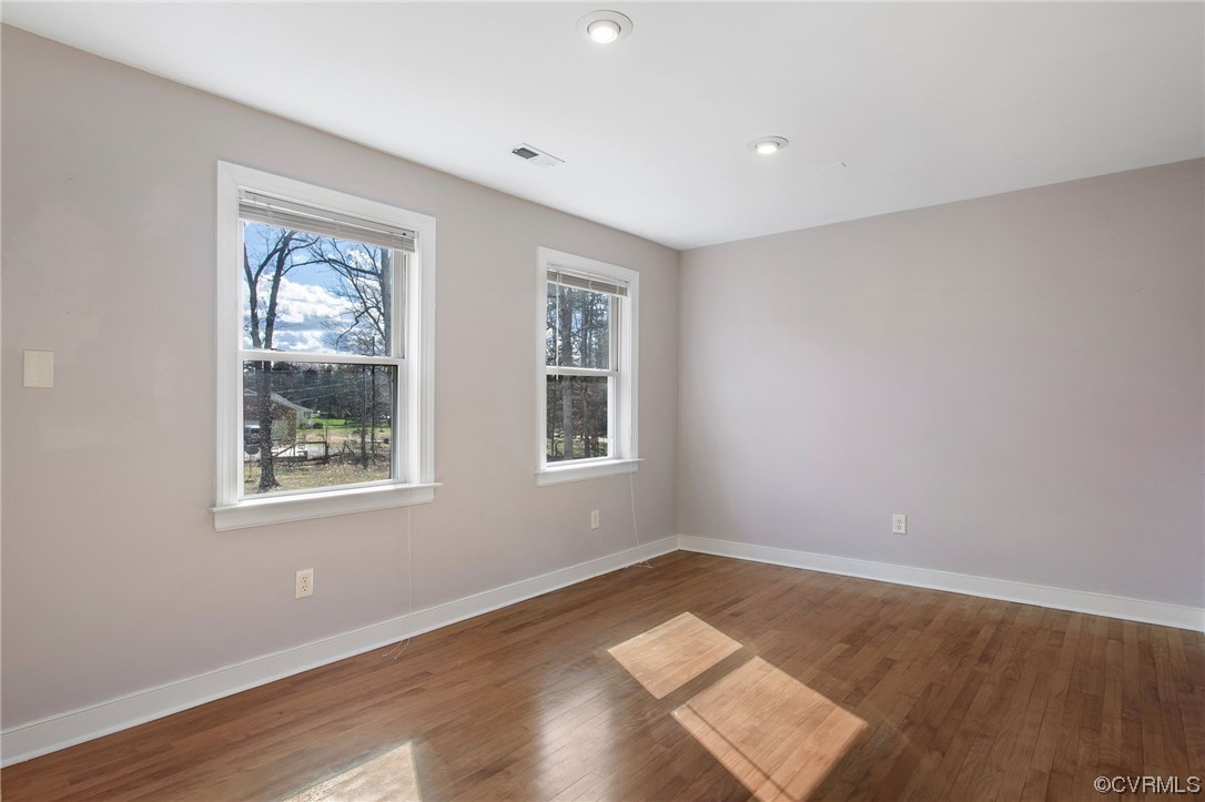 901 Hockett Road Manakin-Sabot, VA 23103 - Photo 28 of 39 a view of wooden floor and windows in a room