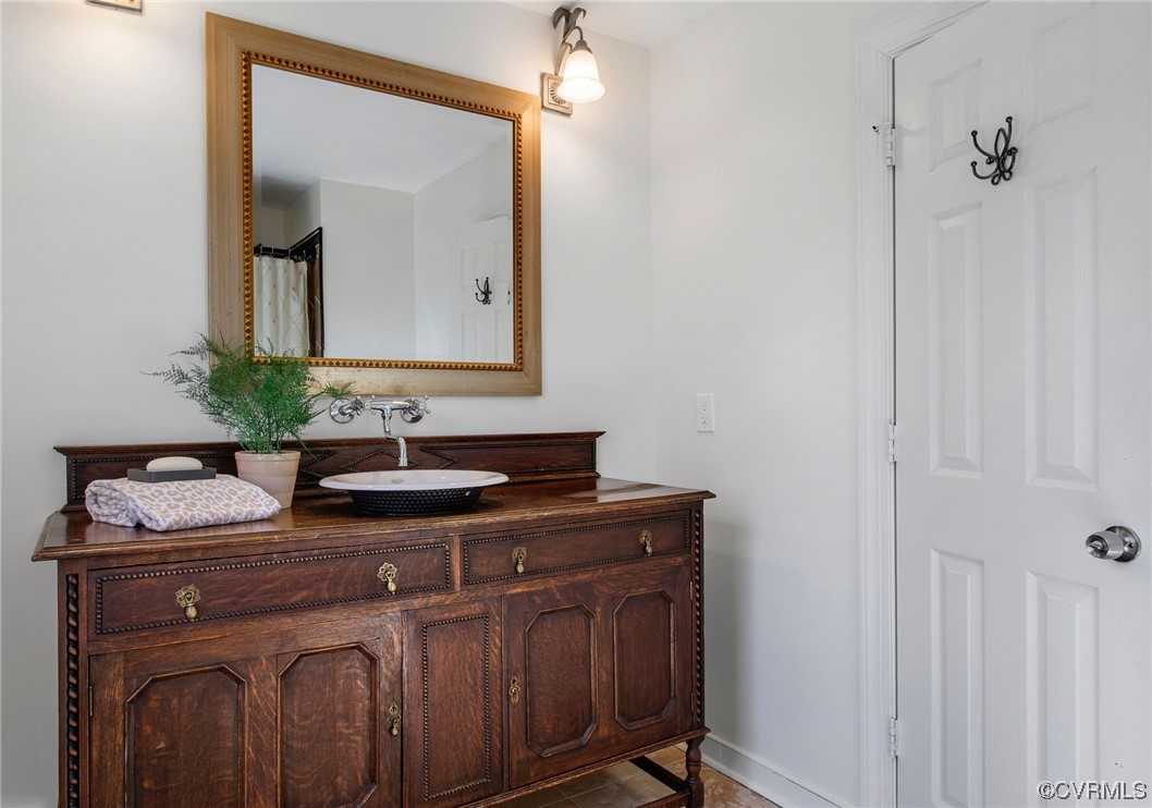 901 Hockett Road Manakin-Sabot, VA 23103 - Photo 29 of 39 a bathroom with a sink and a mirror