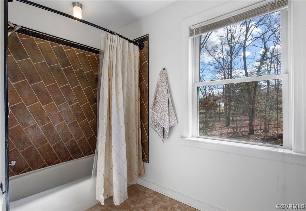 901 Hockett Road Manakin-Sabot, VA 23103 - Photo 30 of 39 a bathroom with a shower and a tub