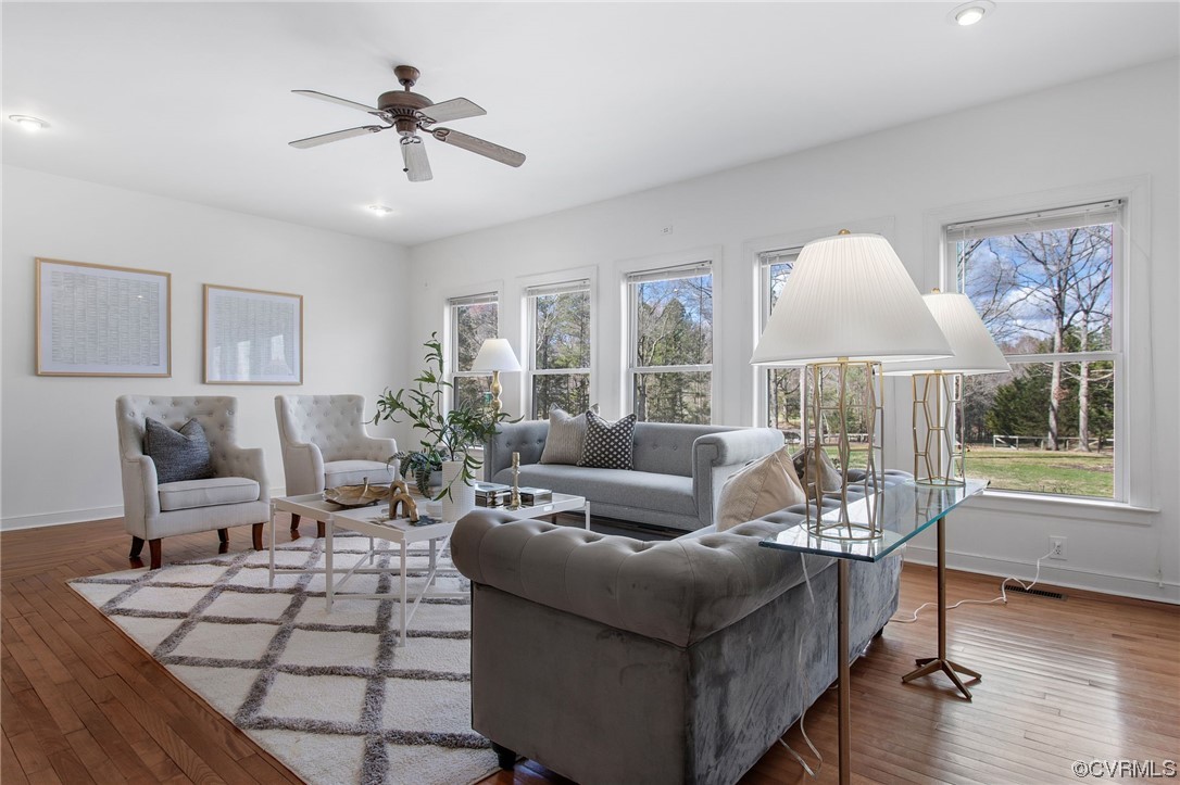 901 Hockett Road Manakin-Sabot, VA 23103 - Photo 7 of 39 a living room with furniture a table and a chandelier