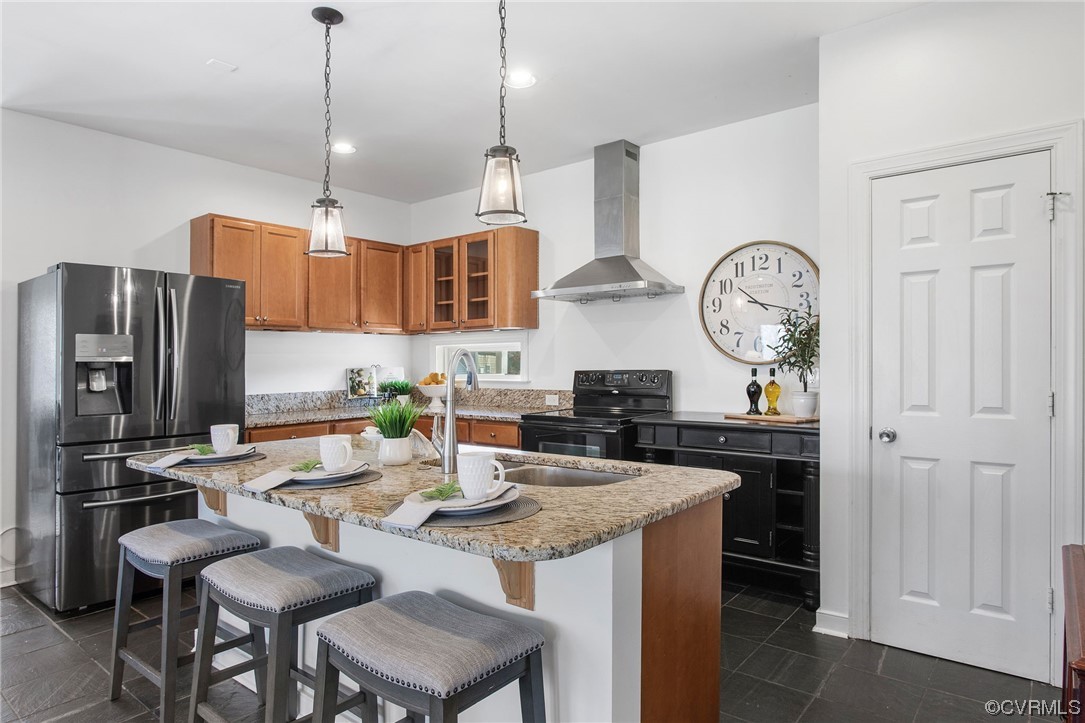 901 Hockett Road Manakin-Sabot, VA 23103 - Photo 10 of 39 a kitchen with a refrigerator a stove a sink and chairs