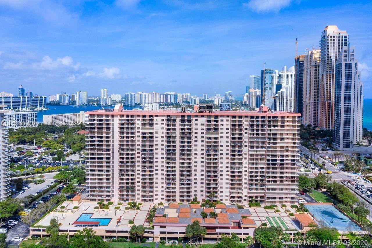 a view of a city with tall buildings