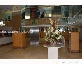 a view of a living room with a hallway