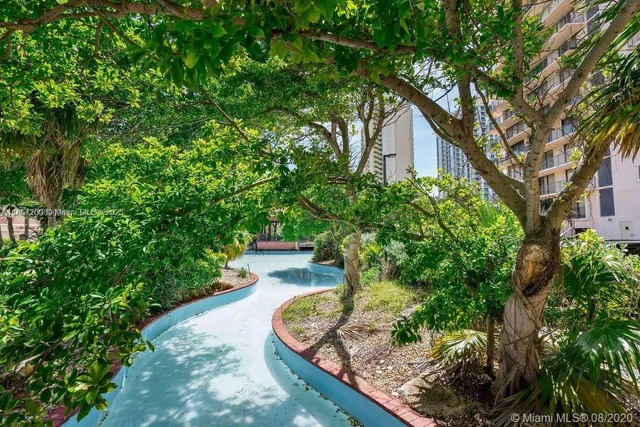 a house view with a garden space