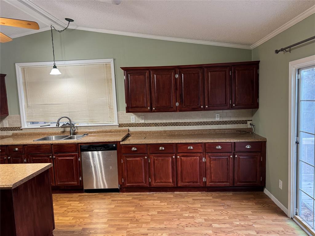 220 Robinson Road Elm Grove, LA 71051 - Photo 20 of 22 a kitchen with a sink and cabinets