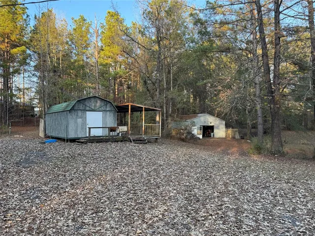 a house with trees in the background