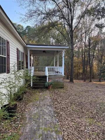 a house view with a outdoor space