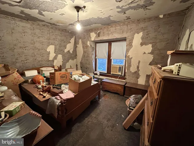 a living room with furniture fireplace and a flat screen tv