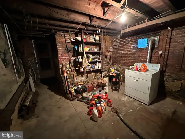 a view of a patio with table and chairs with wooden floor and a potted plants