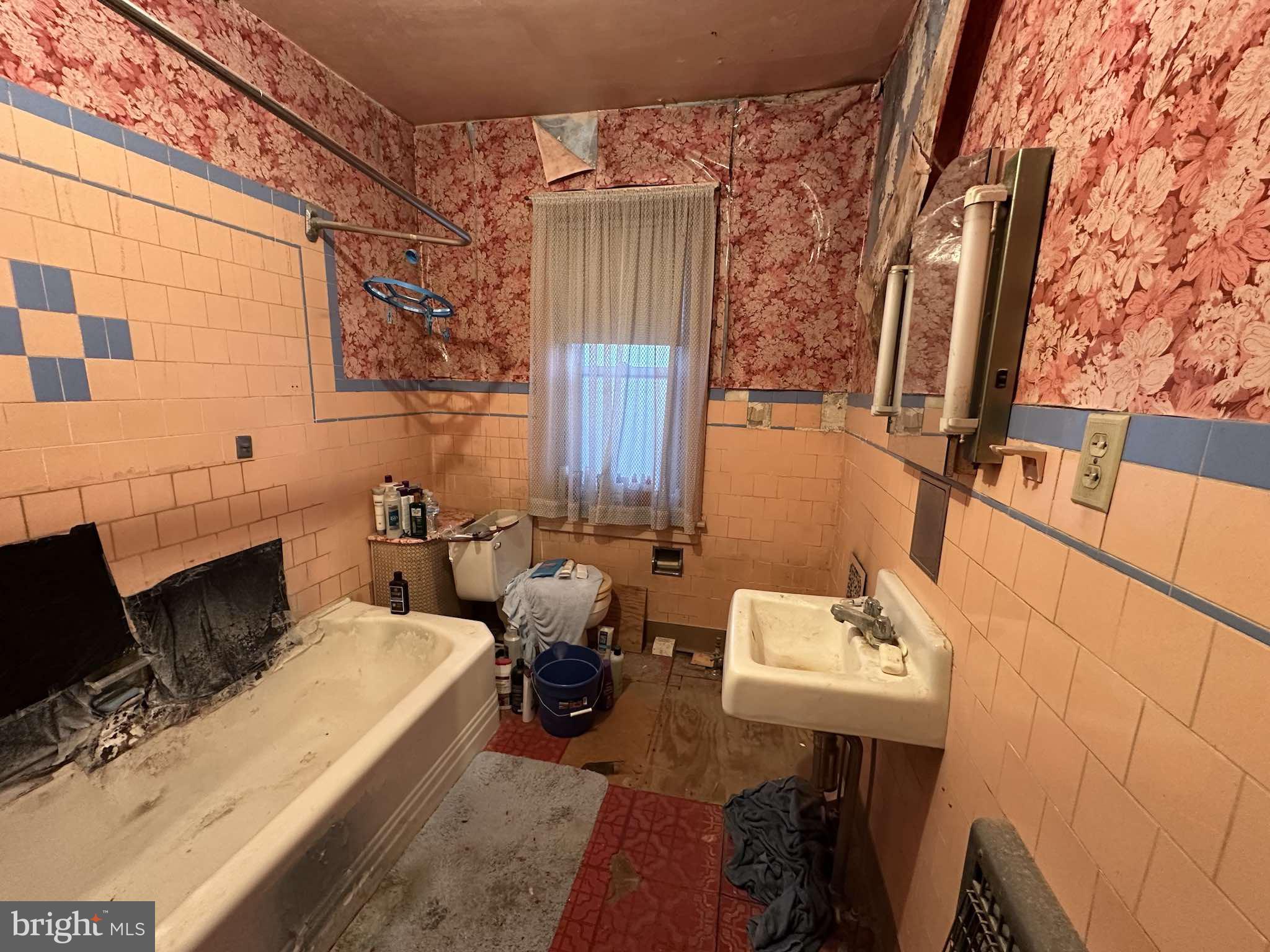 100 South 6th Avenue Reading, PA 19611 - Photo 7 of 19 walk in closet with wooden floor and chair